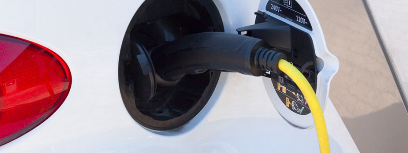 Green Stop producerar el där laddstationerna är placerade. Arkivbild