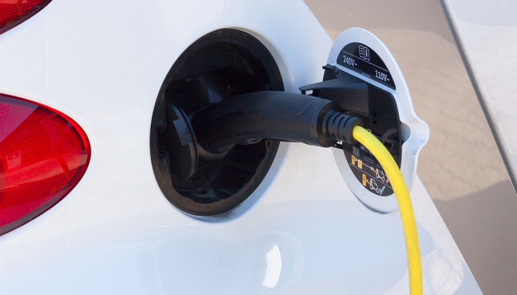 Green Stop producerar el där laddstationerna är placerade. Arkivbild